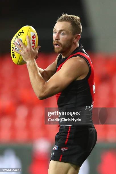 Devon Smith of the Bombers marks during the round 10 AFL match between the Essendon Bombers and the Greater Western Sydney Giants at Metricon Stadium...