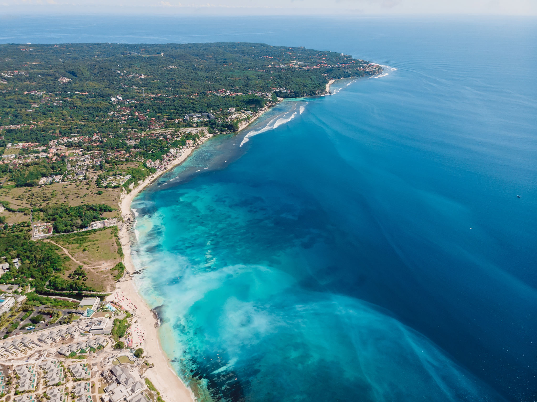 Aerial view of Bukit peninsula with blue ocean in Bali Aerial view of Bukit peninsula with blue ocean in Bali