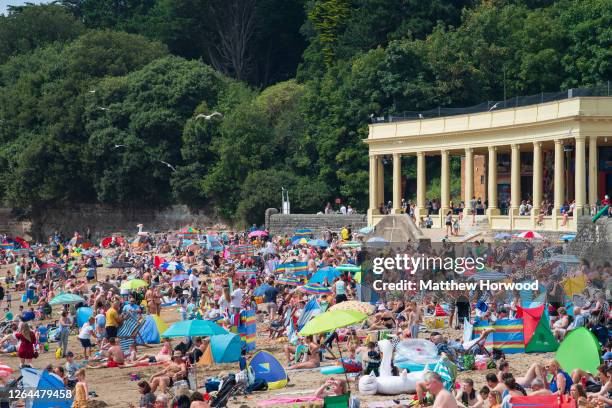 General view of people on the beach at Whitmore Bay, Barry Island on August 7 in Barry, Wales. Forecasters have said Friday could be the hottest day...