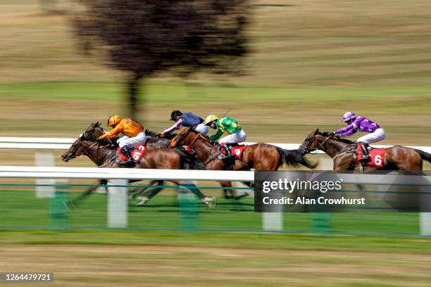 Jim Crowley riding Minhaaj wins The Weybridge Handicap at Sandown Park Racecourse on August 07, 2020 in Esher, England. Owners are allowed to attend...