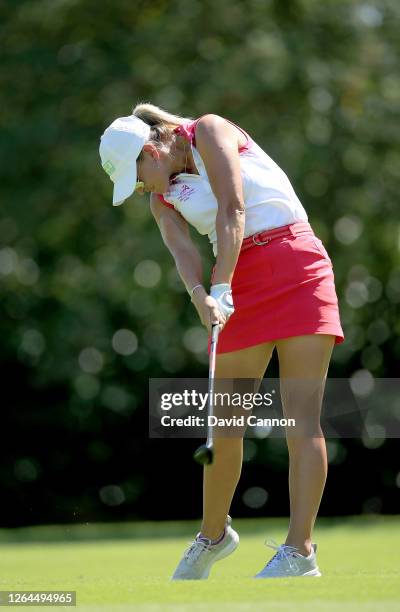 Amy Boulden of Wales plays her second shot on the first hole during day three of The Rose Ladies Series on The West Course at Wentworth Golf Club on...