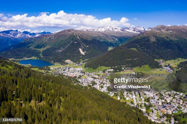 switzerland, canton of grisons, davos, aerial view of alpine town in summer - davos fotografías e imágenes de stock