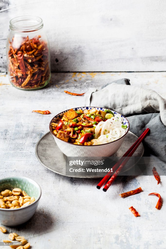 Vegan Kung Pao with tofu, capsicum, peanuts, rice noodles