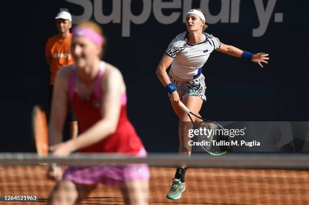 Greet Minnen of Belgium serves during her double match with Alison Van Uytvanck of Belgium against Arantxa Rus of Nederland and Tamara Zidansek of...