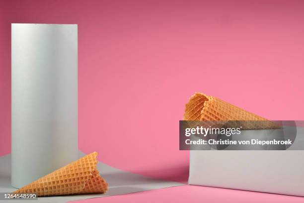 ice cream waffles on plain background - ice cream cone stockfoto's en -beelden