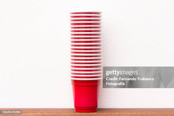 stacked plastic cups - disposable cup stock pictures, royalty-free photos & images