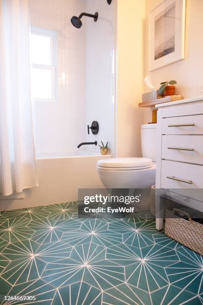 wide low angle empty shot of a newly renovated bathroom. - portland oregon homes stock pictures, royalty-free photos & images