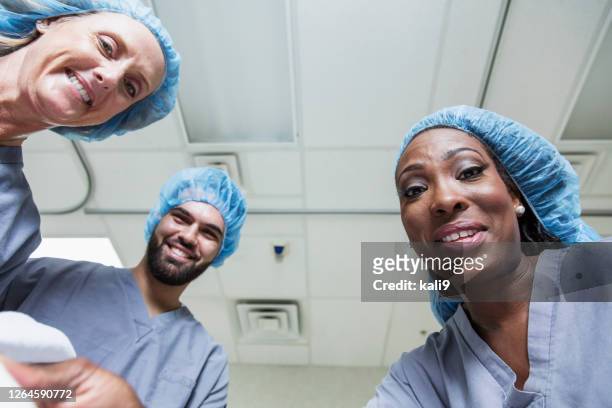 medical team caring for patient, personal point of view - personal perspective doctor stock pictures, royalty-free photos & images