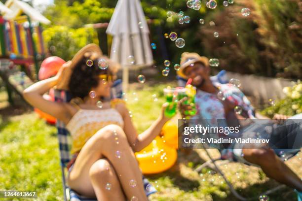 romantic staycation in year 2020 - sun bathing backyard stock pictures, royalty-free photos & images