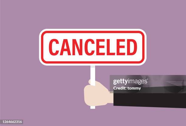 businessman holds a canceled sign - broken contract stock illustrations