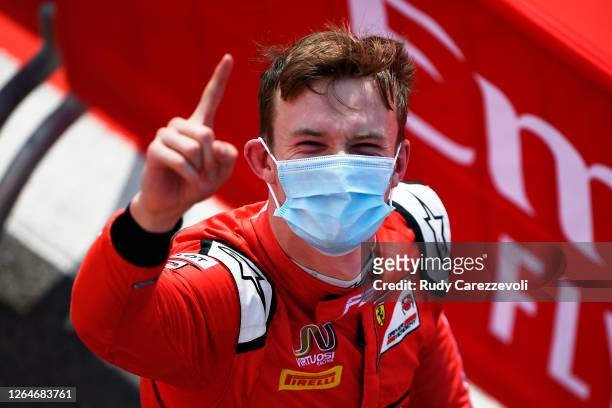 Race winner Callum Ilott of Great Britain and UNI-Virtuosi Racing celebrates in parc ferme during the feature race of the Formula 2 Championship at...
