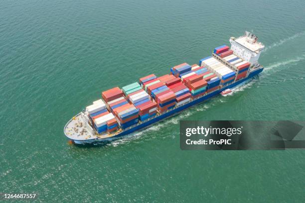 container , container ship in export and import business and logistics. shipping cargo to harbor by crane. water transport international. aerial view and top view - shipping container top view - fotografias e filmes do acervo