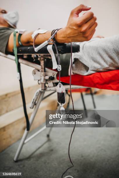 donating blood in hospital, close-up - blood bank stock pictures, royalty-free photos & images