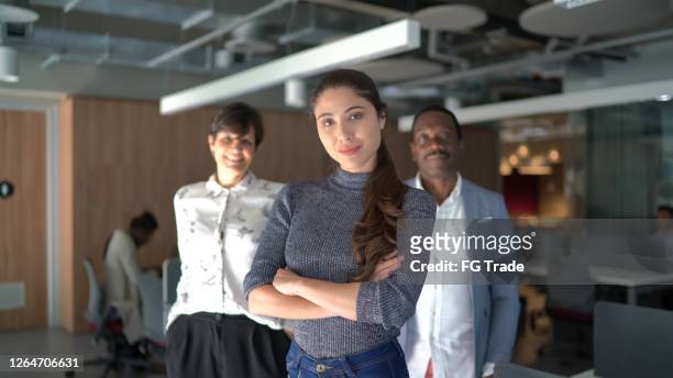 portrait of team at work - founder stock pictures, royalty-free photos & images