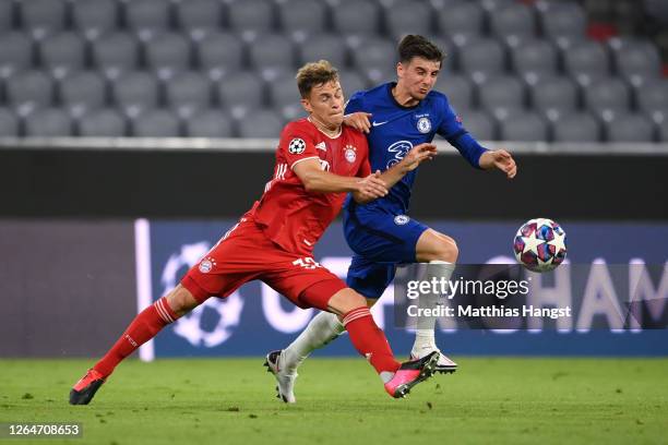 Joshua Kimmich of Bayern Munich battles for possession with Mason Mount of Chelsea during the UEFA Champions League round of 16 second leg match...