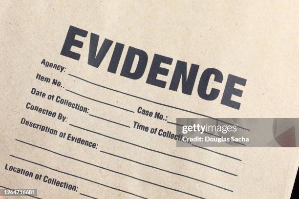 evidence bag for holding items needed to be dna tested - murder case stock pictures, royalty-free photos & images