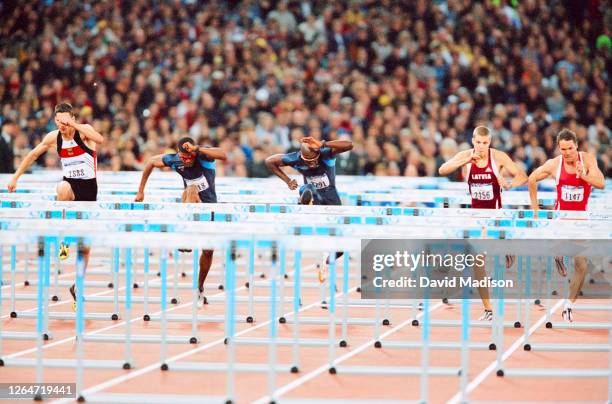 Florian Schwarthoff of Germany, Terrence Trammell of the USA, Allen Johnson of the USA, Stanislavs Olijars of Latvia, and Tomasz Scigaczewski of...