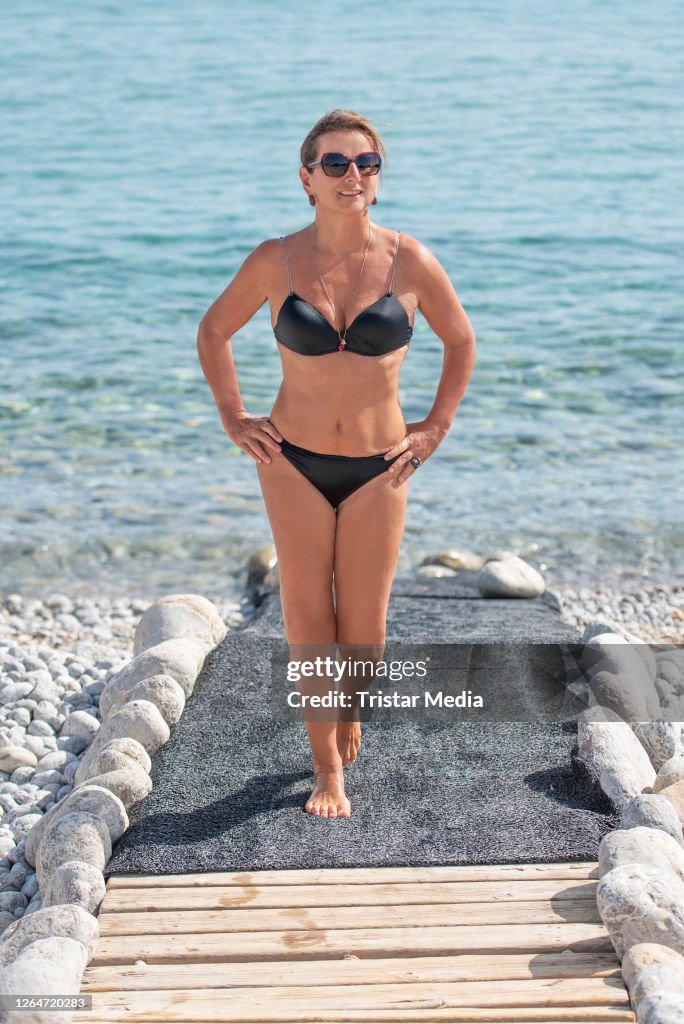 German TV Star Claudia Obert Poses At The Beach During An Exclusive german-tv-star-claudia-obert-poses-at-the-beach-during-an-exclusive