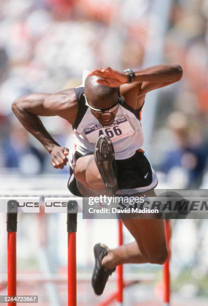 Allen Johnson of the USA competes in the Men's 110 meters Hurdles event of the 2000 USA Track and Field Olympic Trials on July 23, 2000 at Hornet...