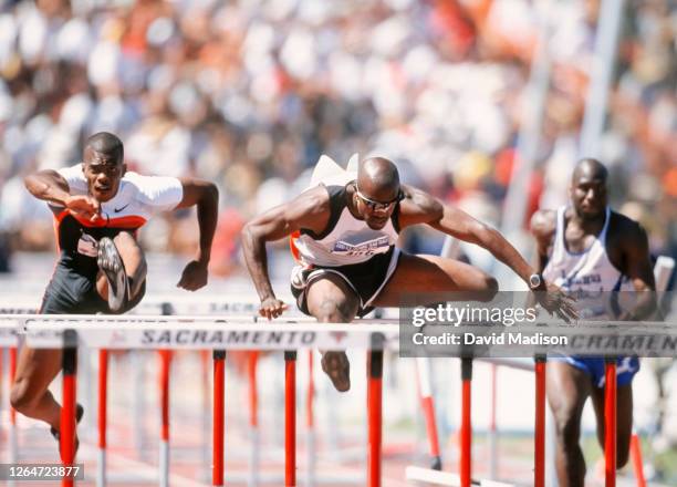 Allen Johnson of the USA competes in the Men's 110 meters Hurdles event of the 2000 USA Track and Field Olympic Trials on July 23, 2000 at Hornet...