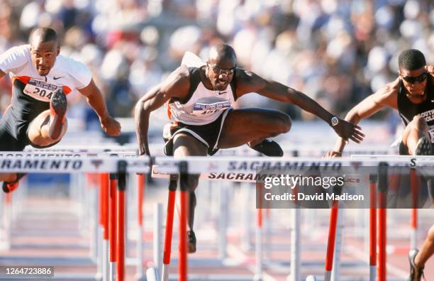 Allen Johnson of the USA competes in the Men's 110 meters Hurdles event of the 2000 USA Track and Field Olympic Trials on July 23, 2000 at Hornet...