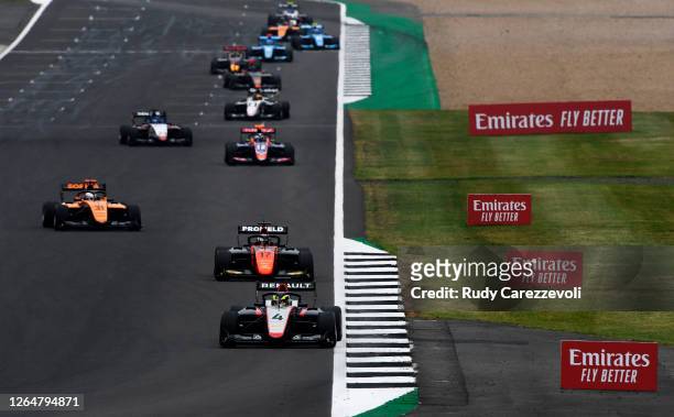 Max Fewtrell of Great Britain and Hitech Grand Prix leads Richard Verschoor of the Netherlands and MP Motorsport during race two of the Formula 3...
