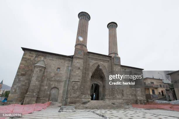 the double minaret madrasa-erzurum, turkey - madressa stock pictures, royalty-free photos & images