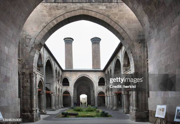 the double minaret madrasa-erzurum, turkey - madressa stock pictures, royalty-free photos & images