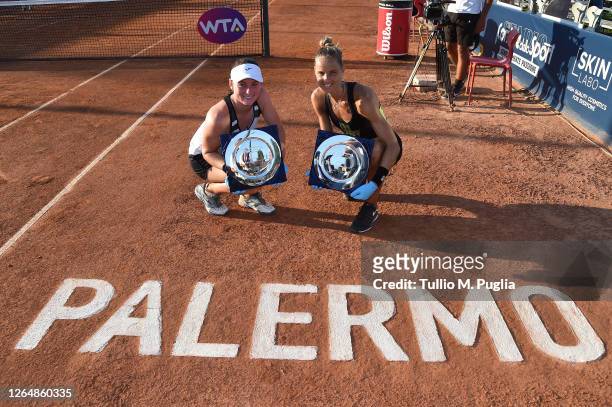 Tamara Zidansek of Slovenia and Arantxa Rus of Nederlands, winners of the women's doubles final match, attend the award ceremony of the 31st Palermo...