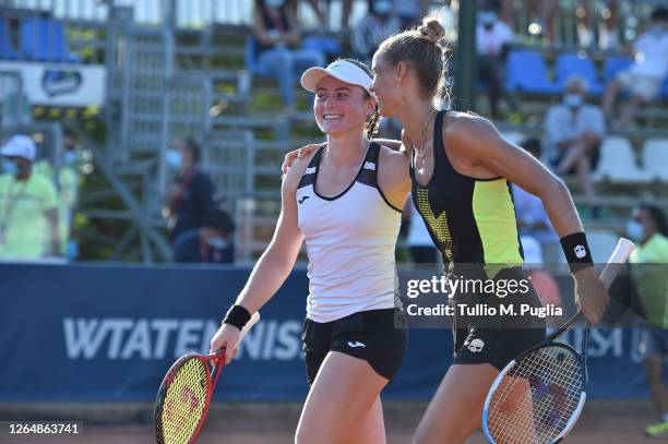 Tamara Zidansek of Slovenia and Arantxa Rus of Nederlands celebrate after winning the women's doubles final match against Elisabetta Cocciaretto and...
