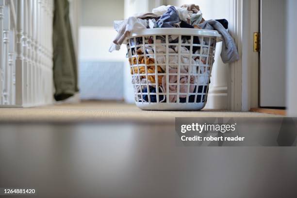 laundry in laundry basket - hamper stock pictures, royalty-free photos & images