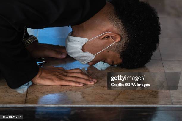 Muslim seen performing Eid al-Adha prayers at the Islamic center of Thailand. Eid al-Adha is one of the two holiest Muslim holidays celebrated each...