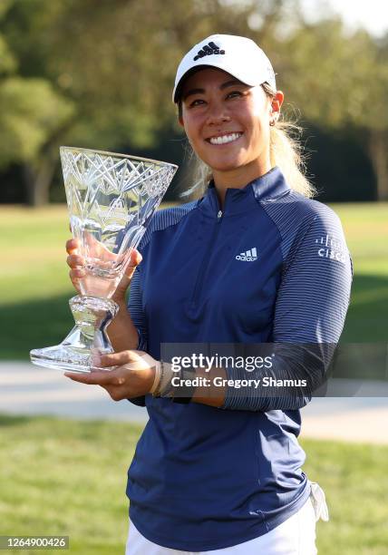 Danielle Kang celebrates with the trophy after winning the Marathon LPGA Classic during the final round at Highland Meadows Golf Club on August 09,...