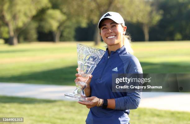 Danielle Kang celebrates with the trophy after winning the Marathon LPGA Classic during the final round at Highland Meadows Golf Club on August 09,...