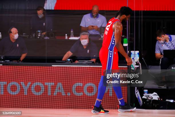 Joel Embiid of the Philadelphia 76ers leaves the game against the Portland Trail Blazers at Visa Athletic Center at ESPN Wide World Of Sports Complex...