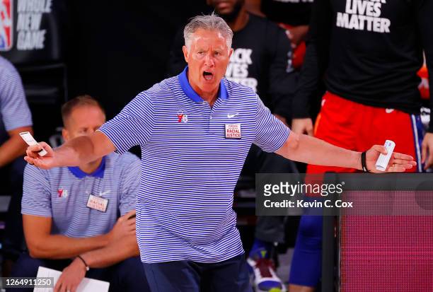 Brett Brown of the Philadelphia 76ers reacts against the Portland Trail Blazers during the third quarter at Visa Athletic Center at ESPN Wide World...