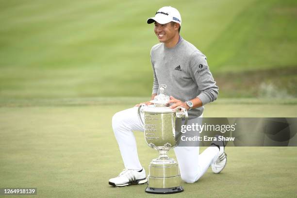 Collin Morikawa of the United States celebrates with the Wanamaker Trophy after winning during the final round of the 2020 PGA Championship at TPC...