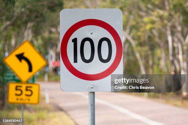 100kph road sign on australian road - limit stock pictures, royalty-free photos & images