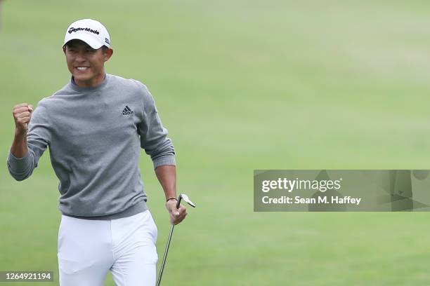 Collin Morikawa of the United States celebrates chipping in for birdie on the 14th hole during the final round of the 2020 PGA Championship at TPC...