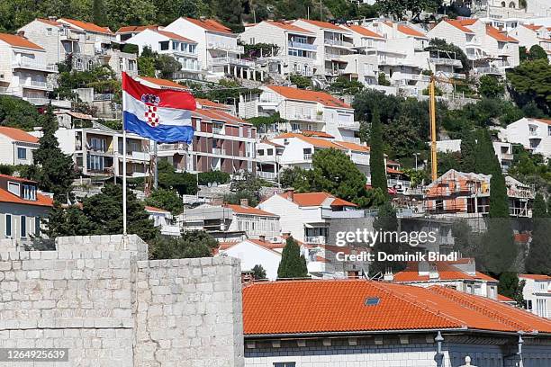 The Croatian flag as seen from the town wall of Dubrovnik on July 24, 2020 in Dubrovnik, Croatia. Located in southern Dalmatia, Dubrovnik is...