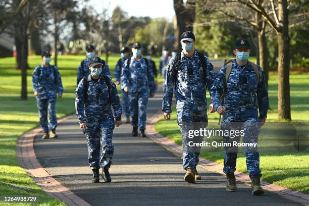 Members of the Australian Defence Force walk through Fitzroy Gardens on August 10, 2020 in Melbourne, Australia. Metropolitan Melbourne is under...