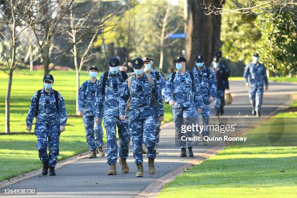 Members of the Australian Defence Force walk through Fitzroy Gardens on August 10, 2020 in Melbourne, Australia. Metropolitan Melbourne is under...
