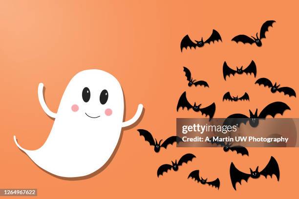 halloween illustration of a ghost and bats - cartoon halloween fotografías e imágenes de stock