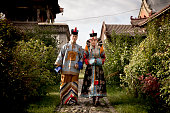 young mongolian couple in traditional clothin