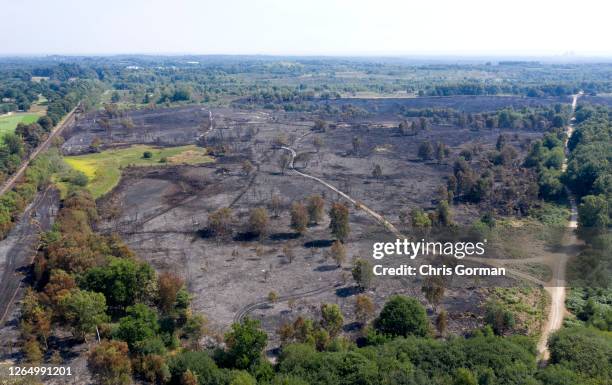 An aerial view of the aftermath of a fire on Chobham Common on August 9 in Surrey, England. The fire started on August 7,2020 cancelling the Rose...