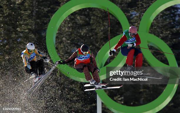 Norway's Audun Groenvold leads the race over Canada's Christopher Delbosco and Australia's Scott Kneller during the semi-final race of the Men's...