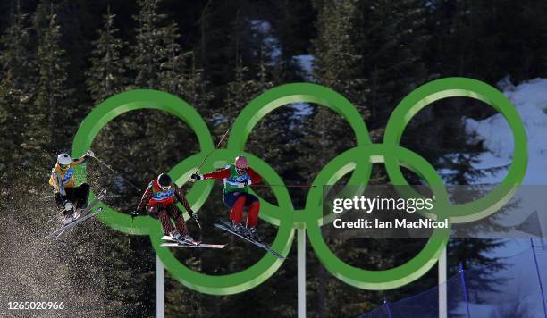 Norway's Audun Groenvold leads the race over Canada's Christopher Delbosco and Australia's Scott Kneller during the semi-final race of the Men's...