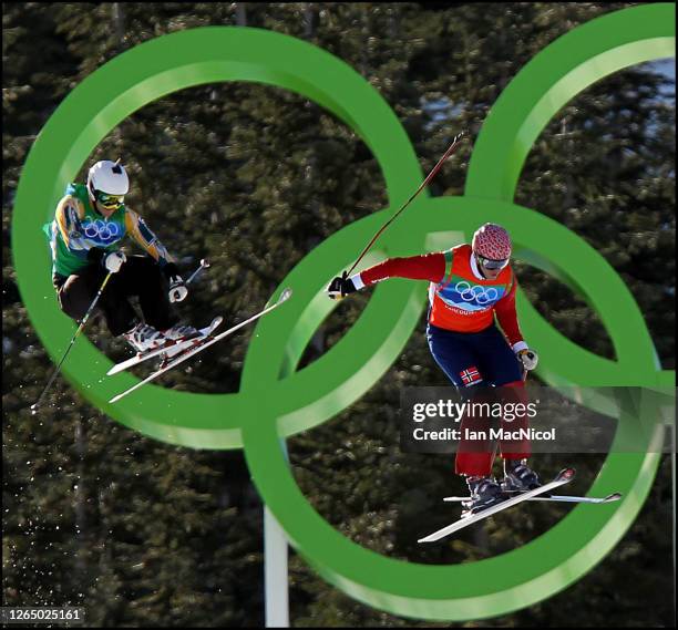 Scott Kneller of Australia and Audun Groenvold of Norway compete in a men's ski cross race on day ten of the Vancouver 2010 Winter Olympics at...