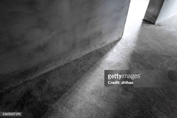 the light effect of a beam of light from the partition of the concrete wall - on location for oblivion stock pictures, royalty-free photos & images