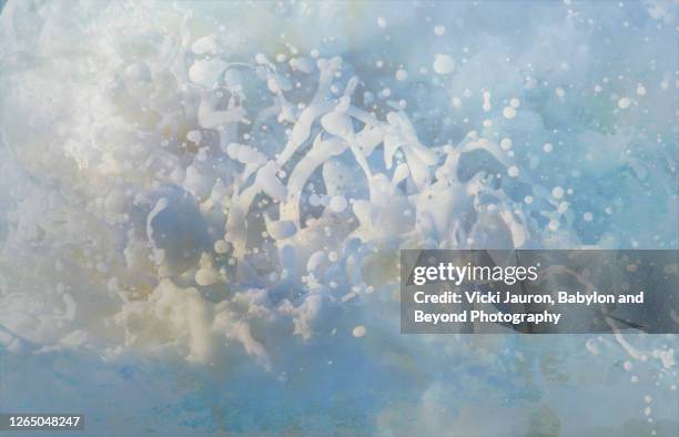 artistic foamy water in wave at jones beach, long island - spray foam stock pictures, royalty-free photos & images